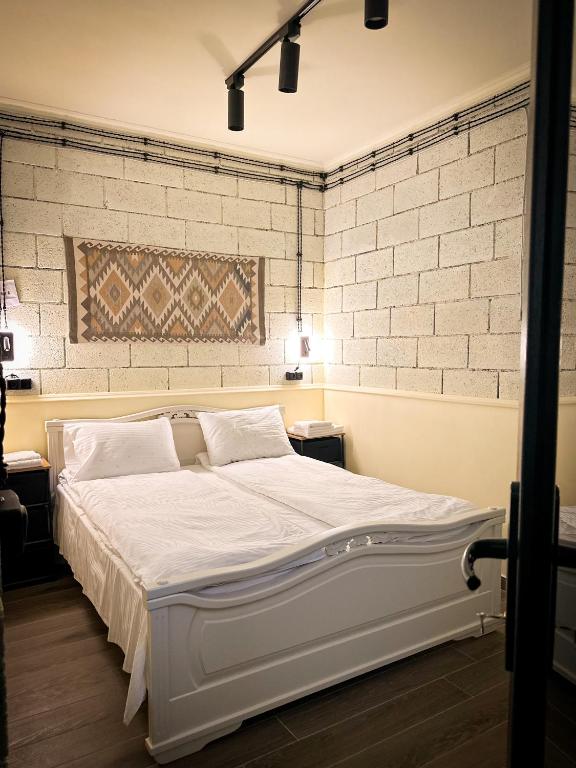 Postel nebo postele na pokoji v ubytování Tiroents Hotel