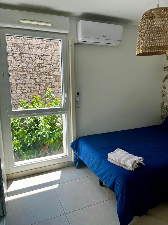 Posteľ alebo postele v izbe v ubytovaní Duplex piscine 3 chambres et Clim proche plages