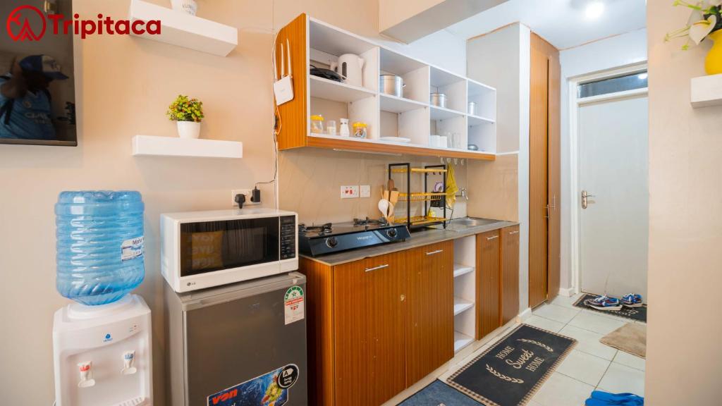 Kuchyň nebo kuchyňský kout v ubytování John Residence