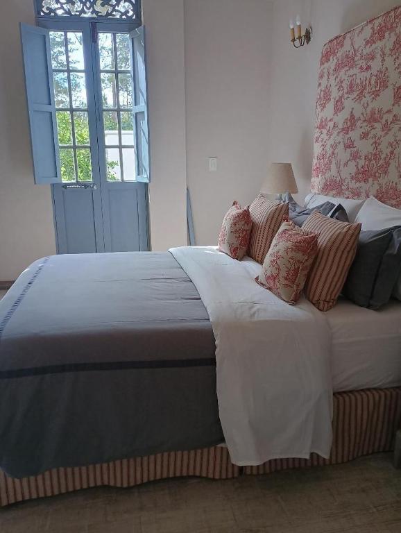 Postel nebo postele na pokoji v ubytování Hotel MasClara