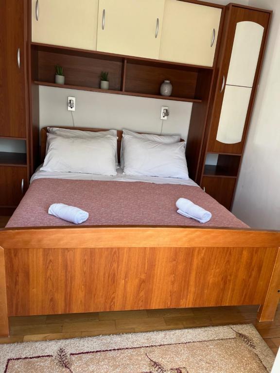 Postel nebo postele na pokoji v ubytování Apartments Znjan