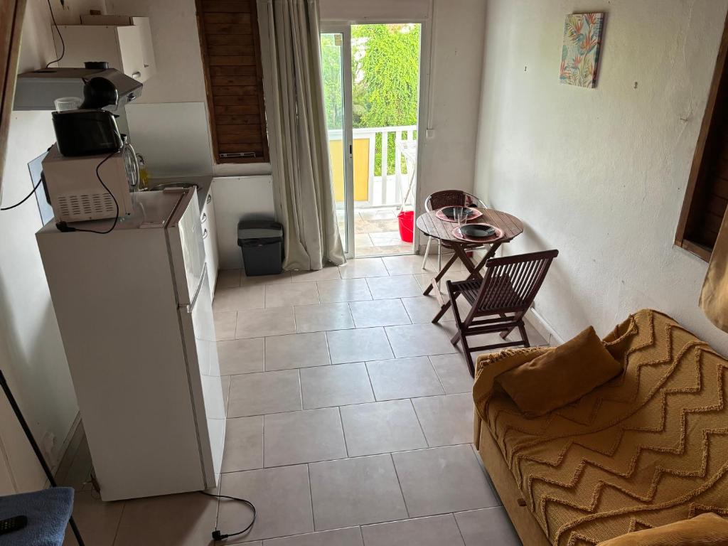 Kuchyň nebo kuchyňský kout v ubytování Residence Chez Marraine Maison BERTILI