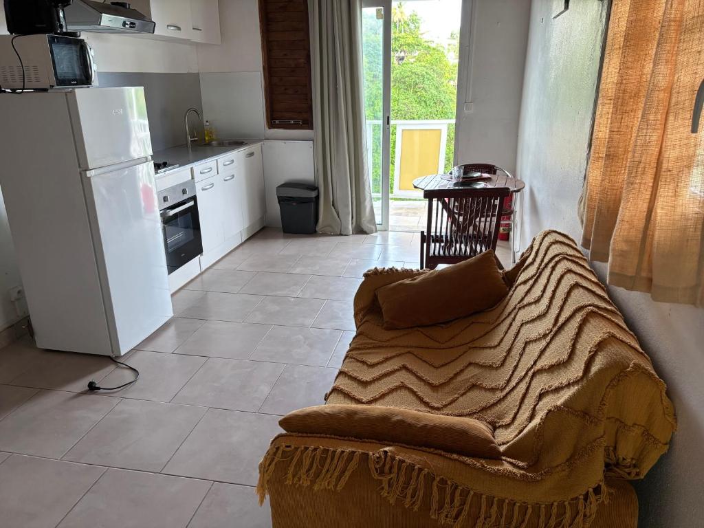 Kuchyň nebo kuchyňský kout v ubytování Residence Chez Marraine Maison BERTILI