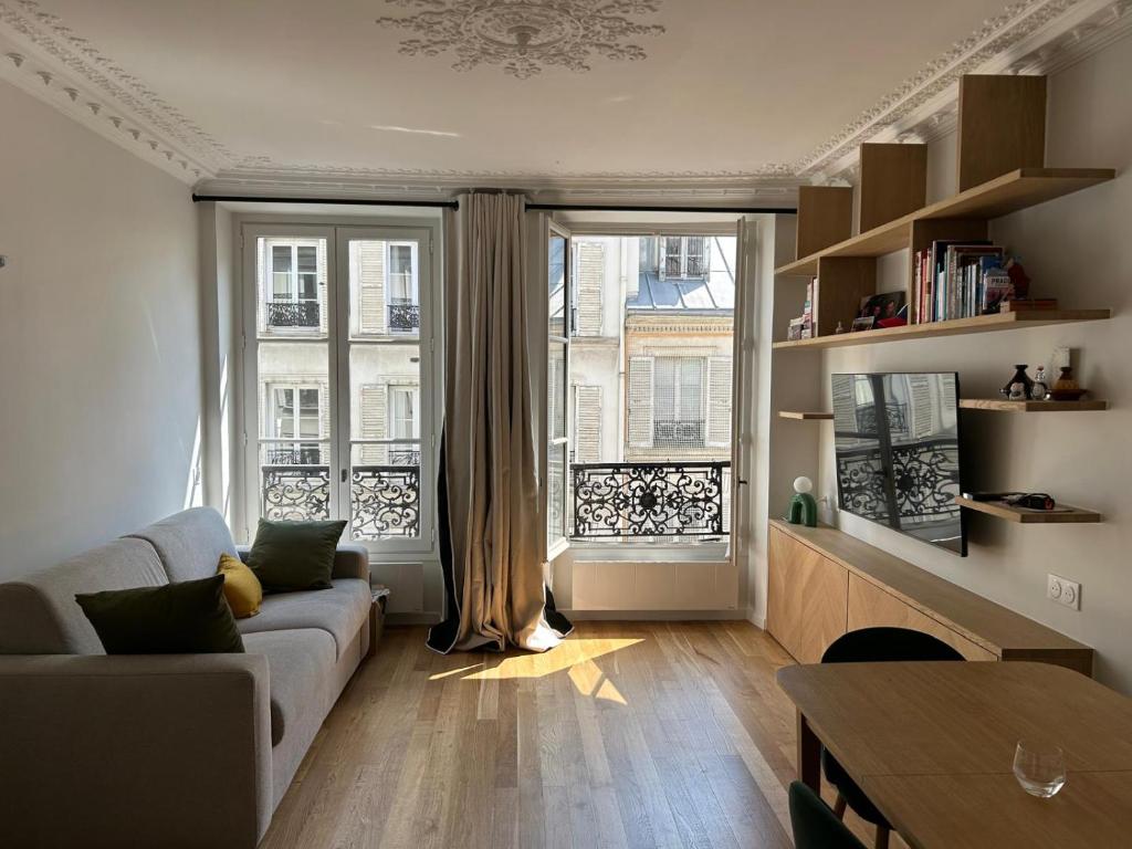 Photo de la galerie de l'établissement Appartement chambre et canapé-lit, à Paris