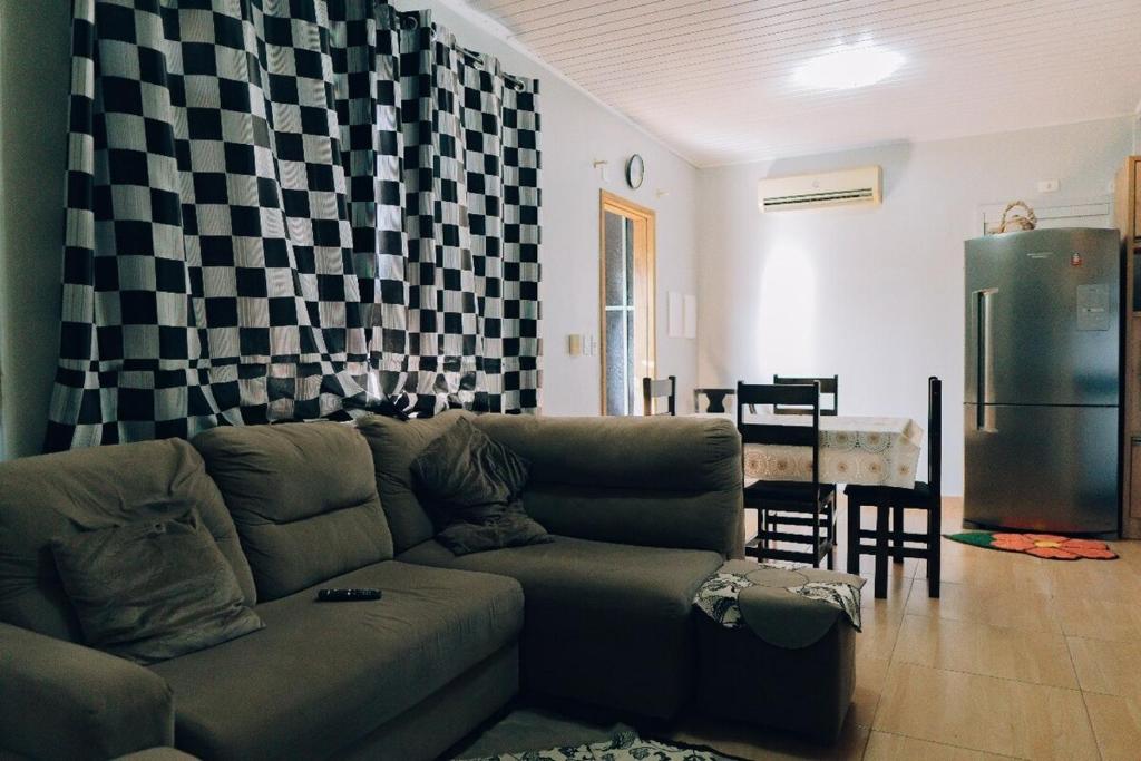 O zonă de relaxare la Casa 3 quartos, até 6 pessoas cataratas