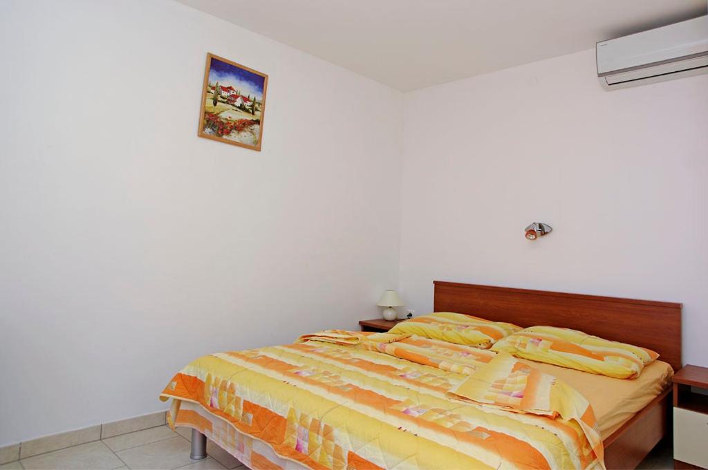 Cama ou camas em um quarto em Foissner Apartments