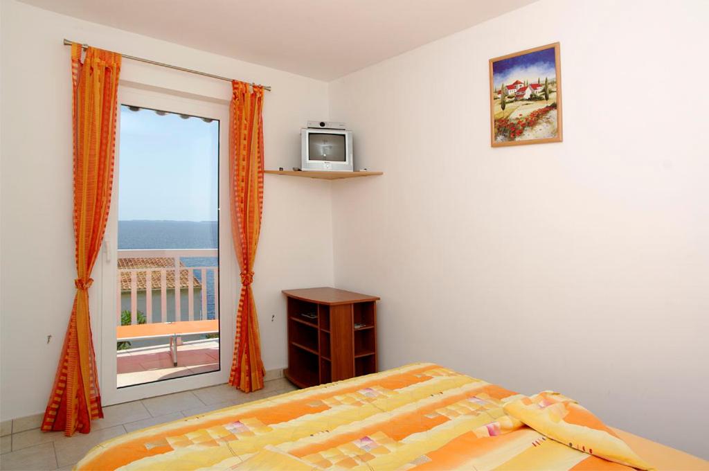 Cama ou camas em um quarto em Foissner Apartments