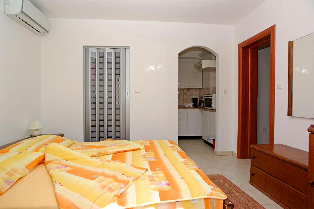 Cama ou camas em um quarto em Foissner Apartments