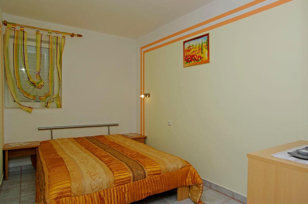 Cama ou camas em um quarto em Foissner Apartments