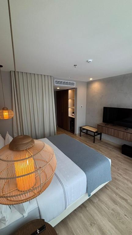 Postel nebo postele na pokoji v ubytování Sonesta Hotel Ibagué