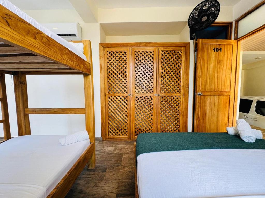 Postel nebo postele na pokoji v ubytování Merakai Hostel Rincon del Mar