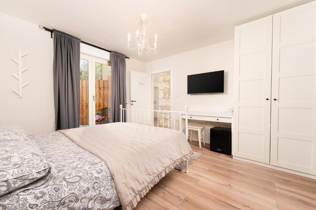 Postel nebo postele na pokoji v ubytování Accommodation TRI MURVE