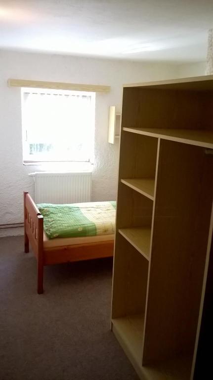 Postel nebo postele na pokoji v ubytování Guest House Honzik