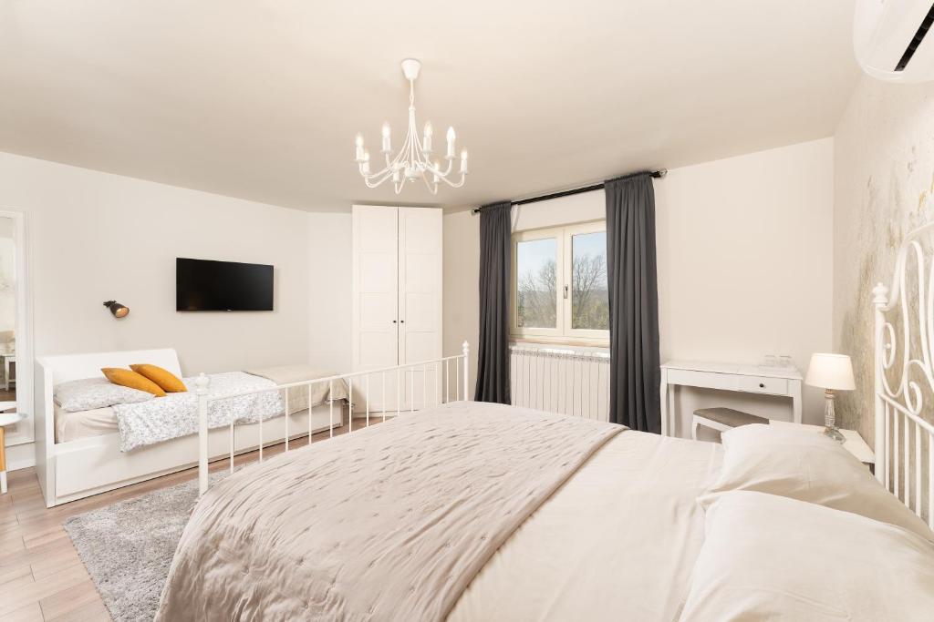 Postel nebo postele na pokoji v ubytování Accommodation TRI MURVE