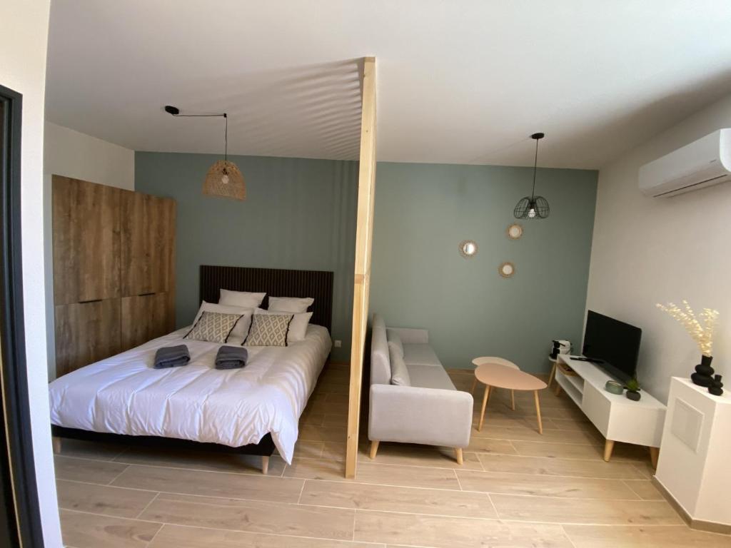 Postel nebo postele na pokoji v ubytování Vina Rhôna