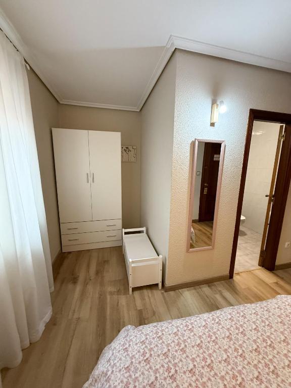 Cama o camas de una habitación en Hostería El Cruce
