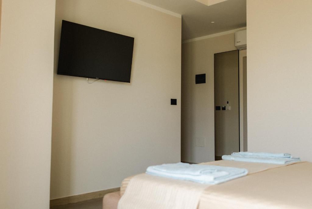 Postel nebo postele na pokoji v ubytování Ritson Hotel