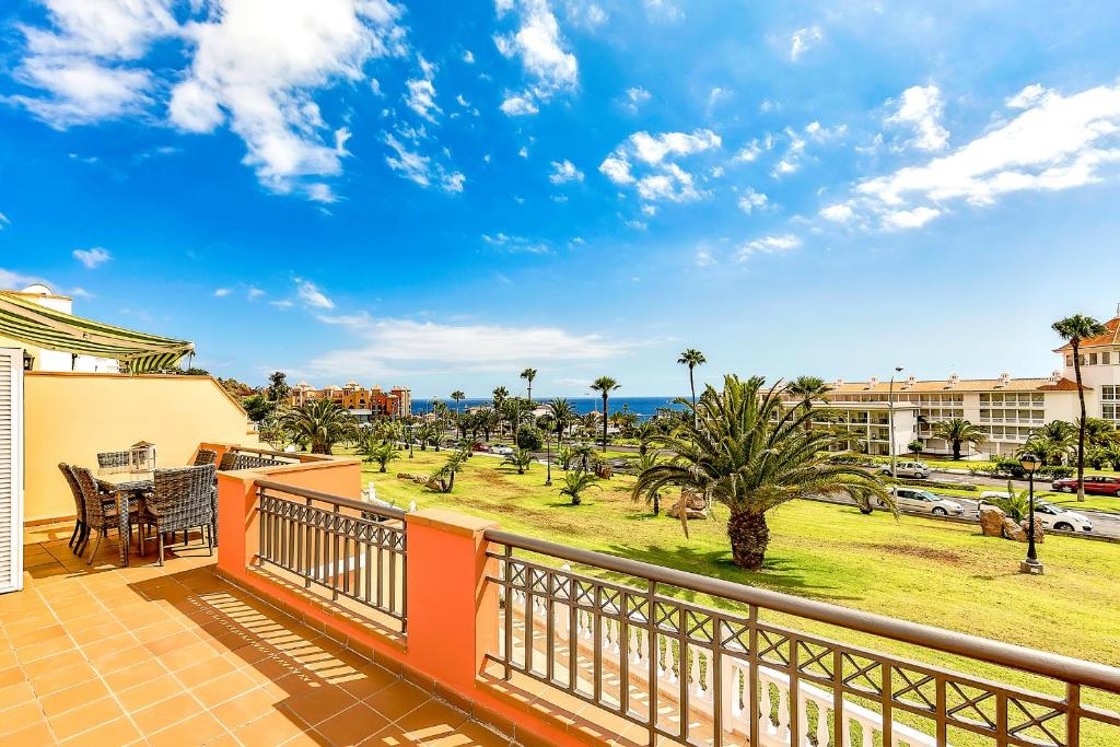 a balcony with a view of the ocean at El Veril del Duque Apartment in Adeje