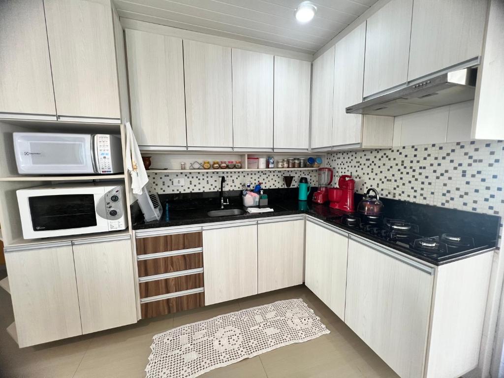 Kuchyň nebo kuchyňský kout v ubytování Brisas di mar