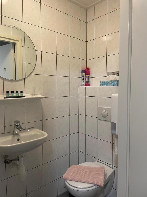 Koupelna v ubytování B&B Plompetorenzicht