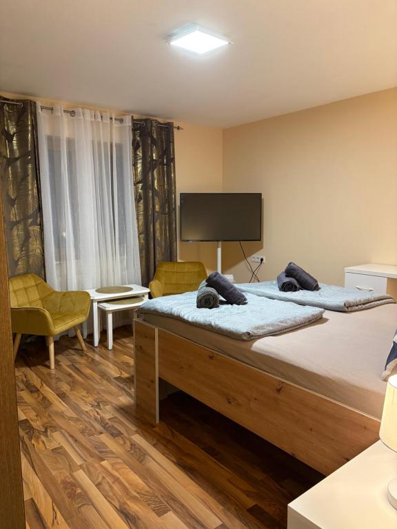 Postel nebo postele na pokoji v ubytování Marina