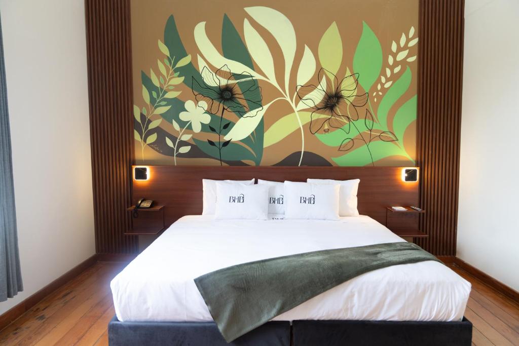 Postel nebo postele na pokoji v ubytování Bosco Hotel Boutique