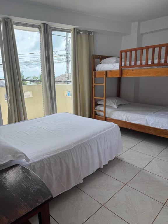 Postel nebo postele na pokoji v ubytování HOTEL PAL-MAR
