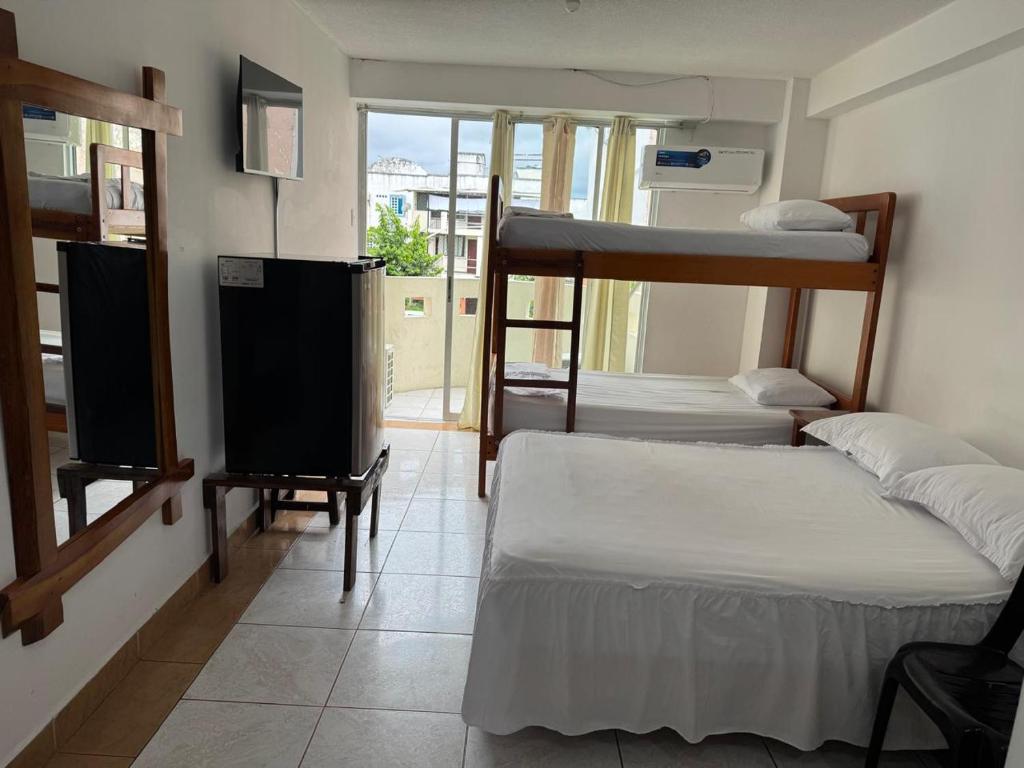 Postel nebo postele na pokoji v ubytování HOTEL PAL-MAR