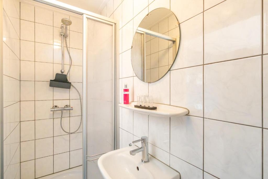 Koupelna v ubytování B&B Plompetorenzicht