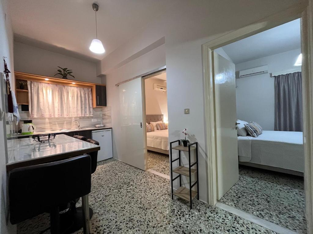 Letto o letti in una camera di Nikos Studios