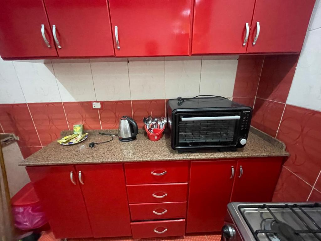 Kuchyň nebo kuchyňský kout v ubytování Marvel apartment