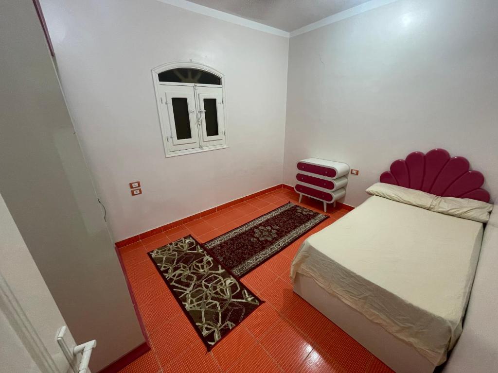 Postel nebo postele na pokoji v ubytování Marvel apartment