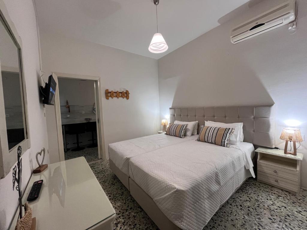 Letto o letti in una camera di Nikos Studios