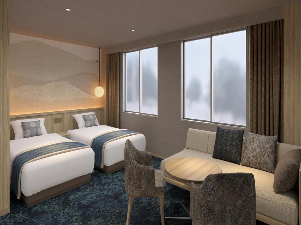 Postel nebo postele na pokoji v ubytování KAMENOI HOTEL Oarai