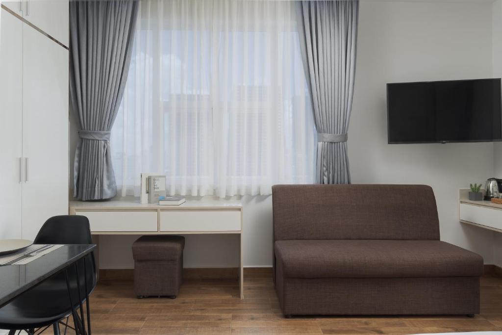 Posezení v ubytování Amana Hotel & Residences