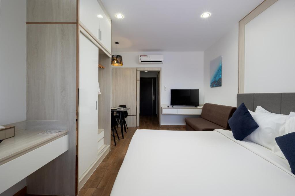 TV a/nebo společenská místnost v ubytování Amana Hotel & Residences