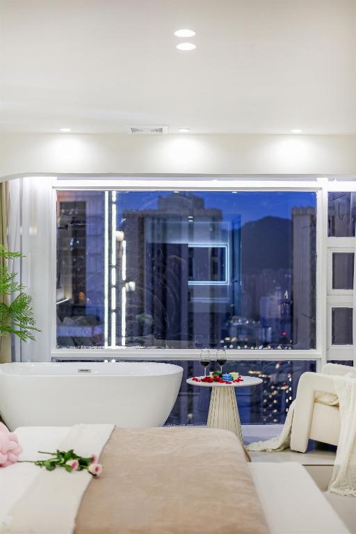 Posezení v ubytování Baihong Riverview aparment-Chongqing Jiefangbei