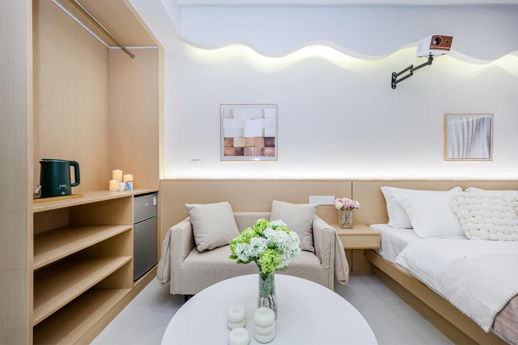 Posezení v ubytování Baihong Riverview aparment-Chongqing Jiefangbei