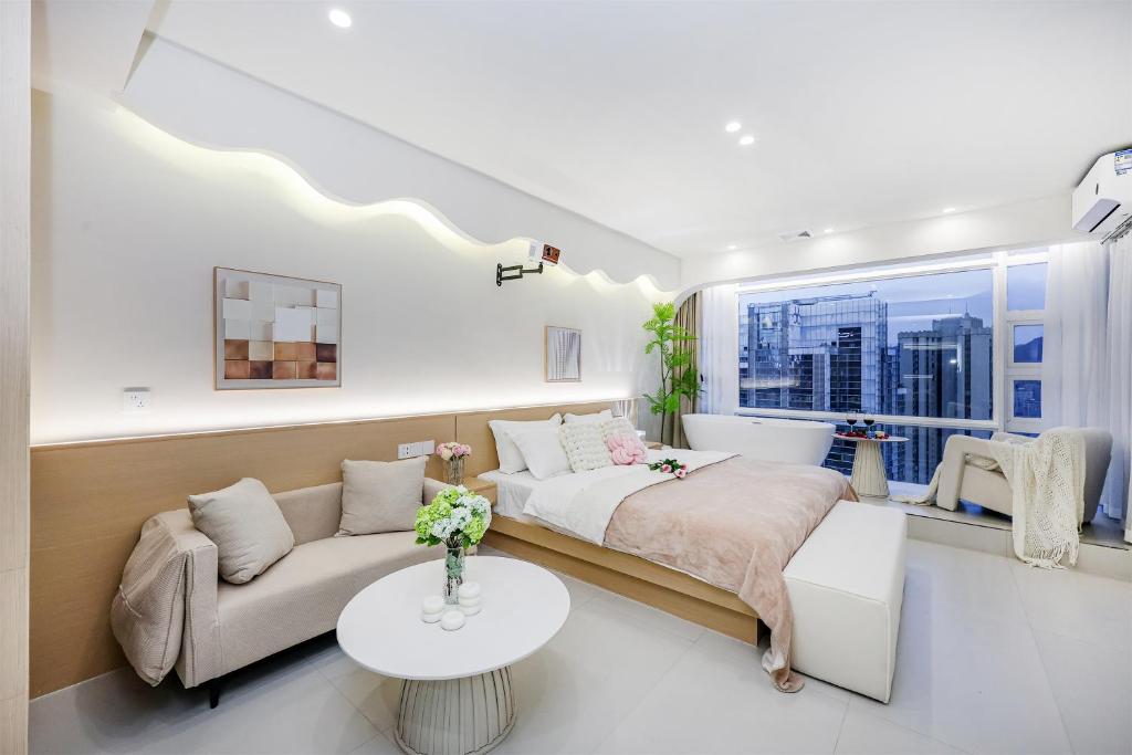 Posezení v ubytování Baihong Riverview aparment-Chongqing Jiefangbei