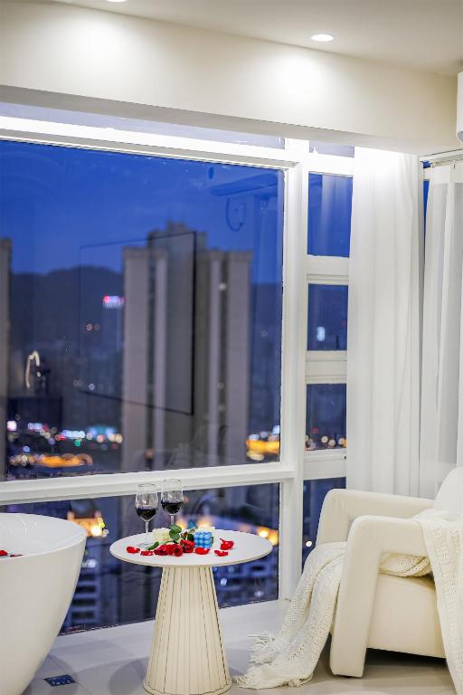 Posezení v ubytování Baihong Riverview aparment-Chongqing Jiefangbei