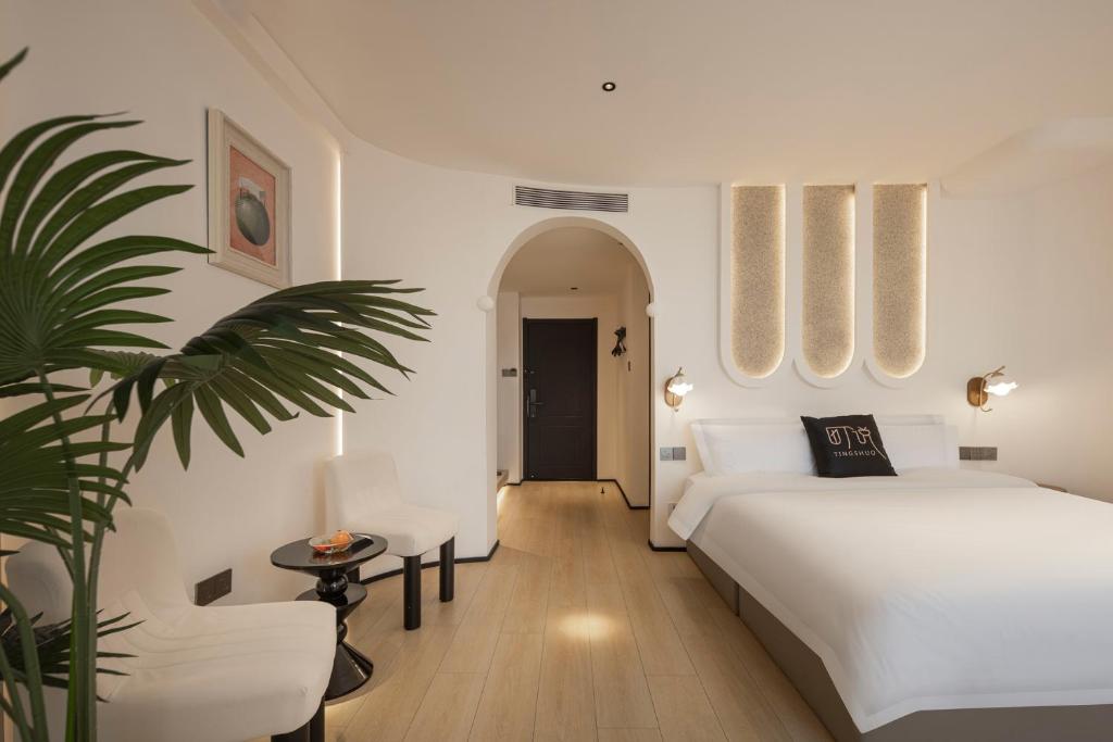 Postel nebo postele na pokoji v ubytování Town Designer B&B