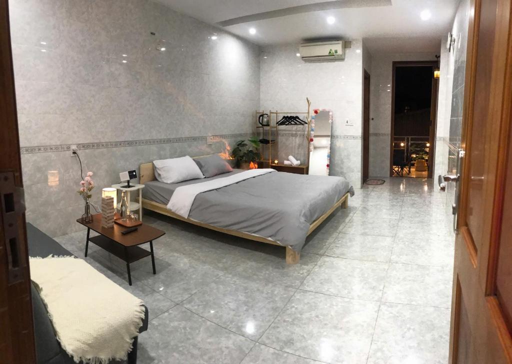 Postel nebo postele na pokoji v ubytování DU Home Huế