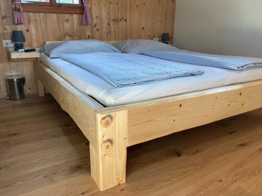Postel nebo postele na pokoji v ubytování Ferienhütte Troadkostn