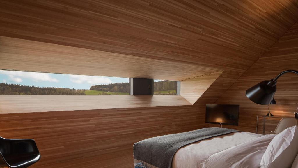 Postel nebo postele na pokoji v ubytování Hotel Krone Regensberg