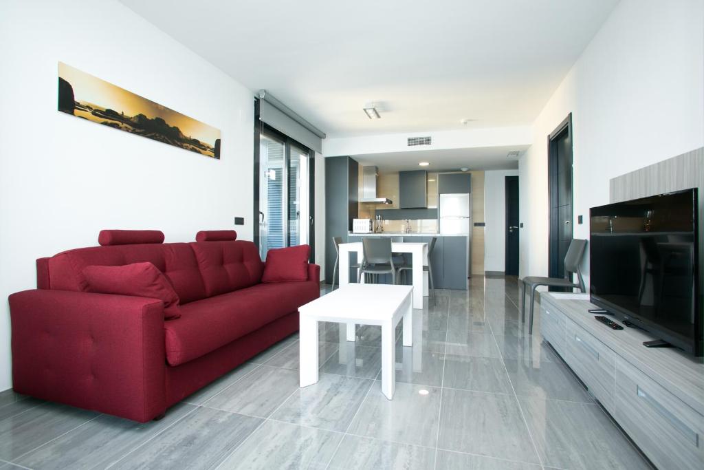 TV a/nebo společenská místnost v ubytování Apartamentos Fuengirola Playa