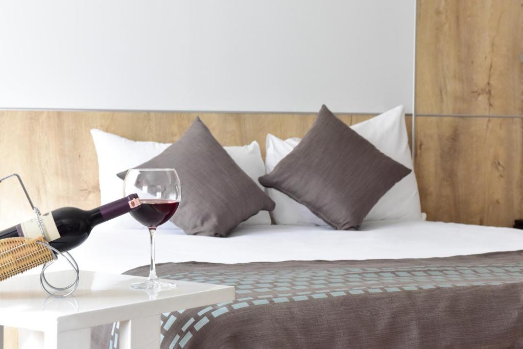 Una cama o camas en una habitación de Agaoglu Otel