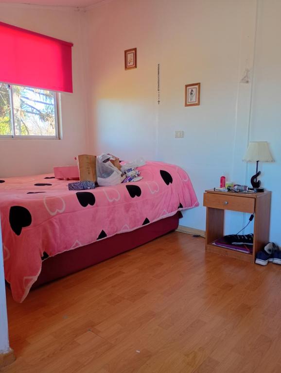Ένα ή περισσότερα κρεβάτια σε δωμάτιο στο Campestre hostal