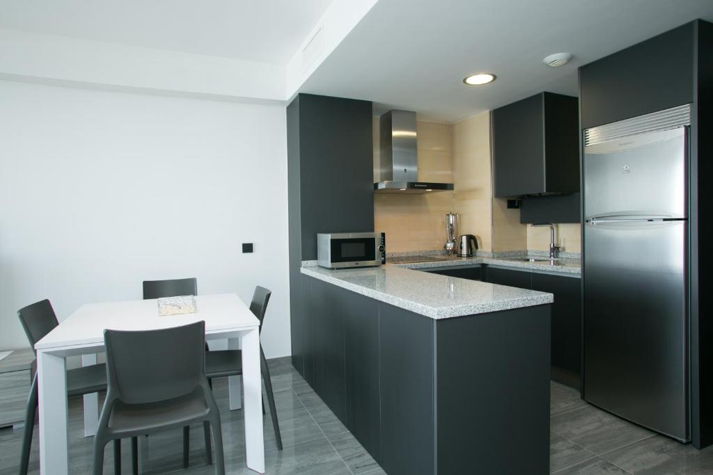 Kuchyň nebo kuchyňský kout v ubytování Apartamentos Fuengirola Playa