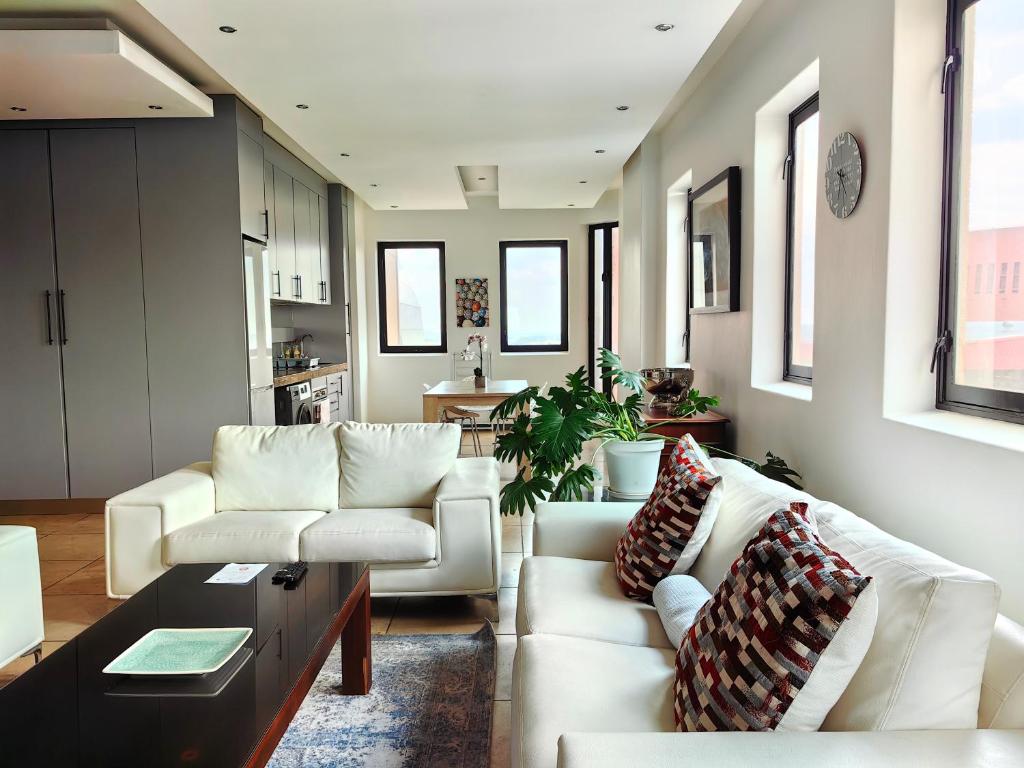 Posezení v ubytování 4 on Pritchard Luxury Suites