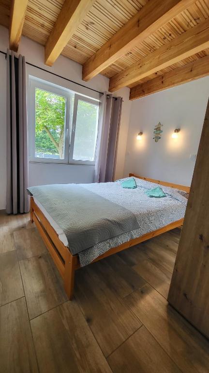 Postel nebo postele na pokoji v ubytování Malownicza Dolina